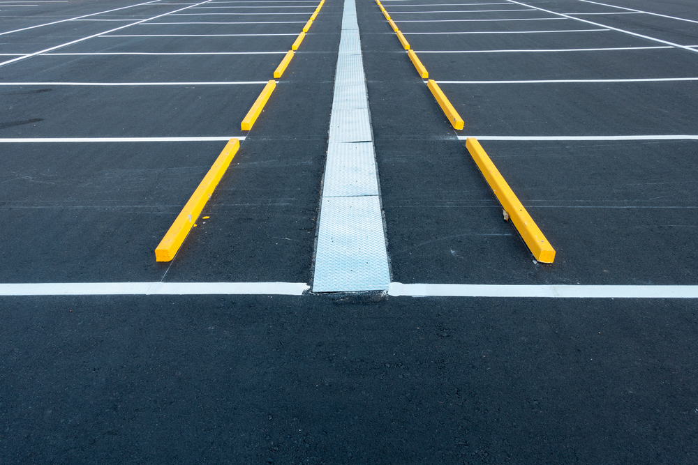 Empty,Car,Parking,Lot,And,Asphalt,Slab,Pavement,,City,Vehicle